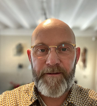 Mark L.